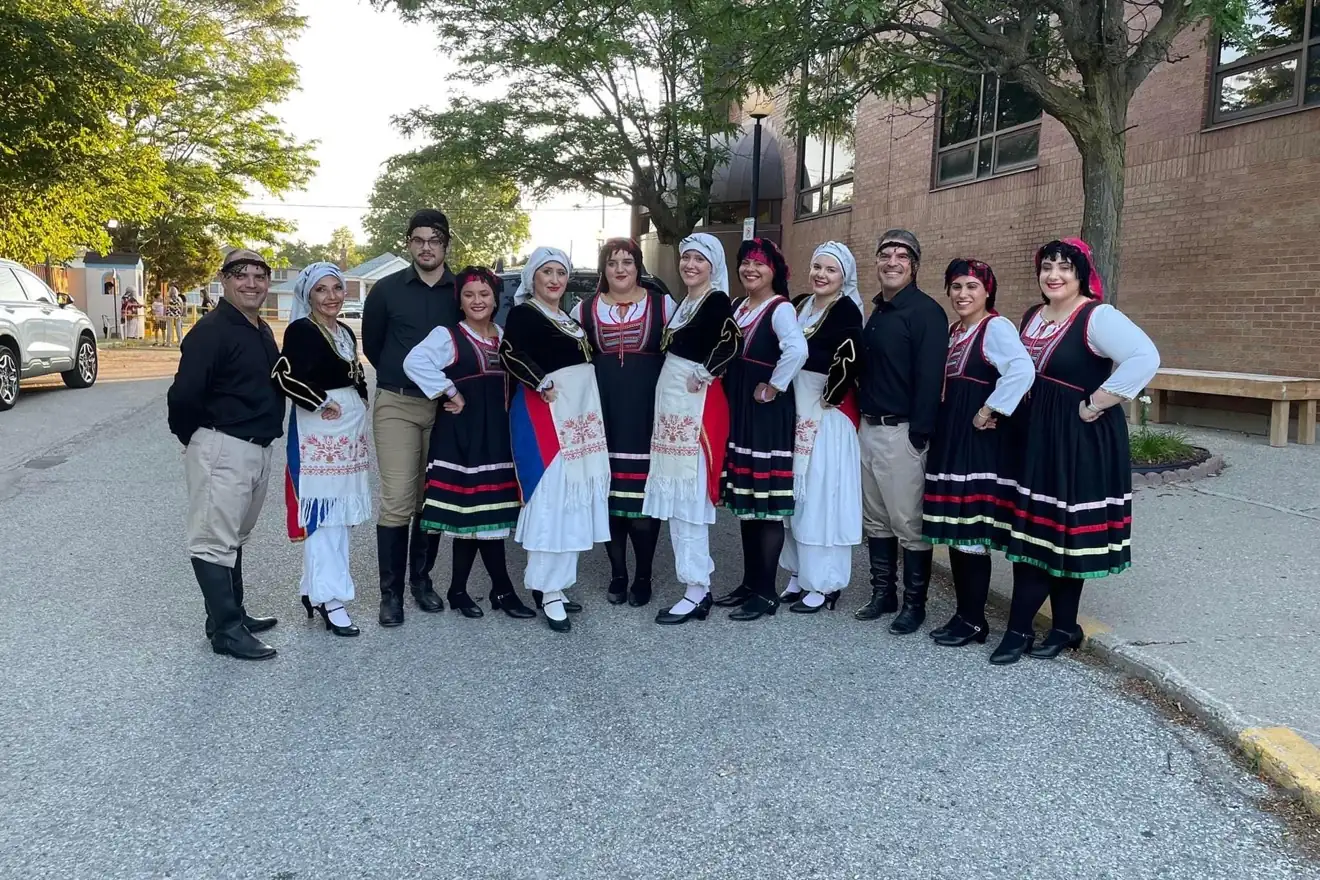 The full Levendia-X troupe posing together in traditional Greek dress