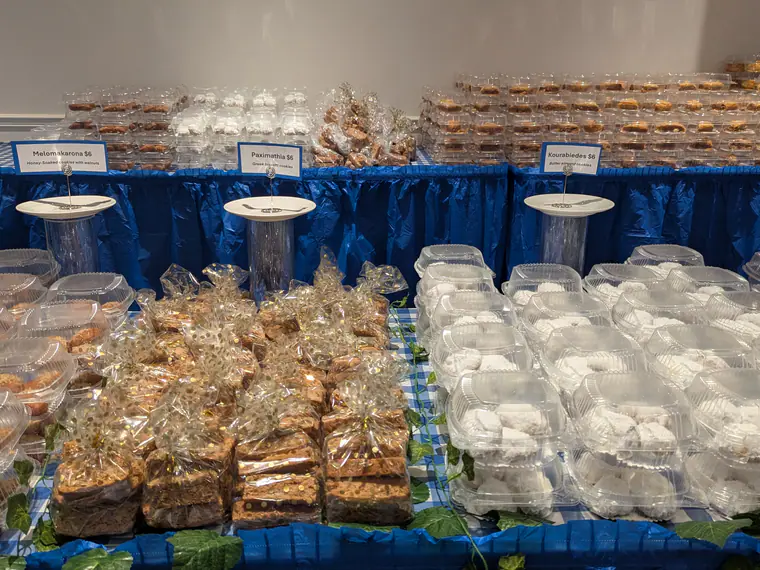 Baklava and Greek sweets stacked on the dessert table